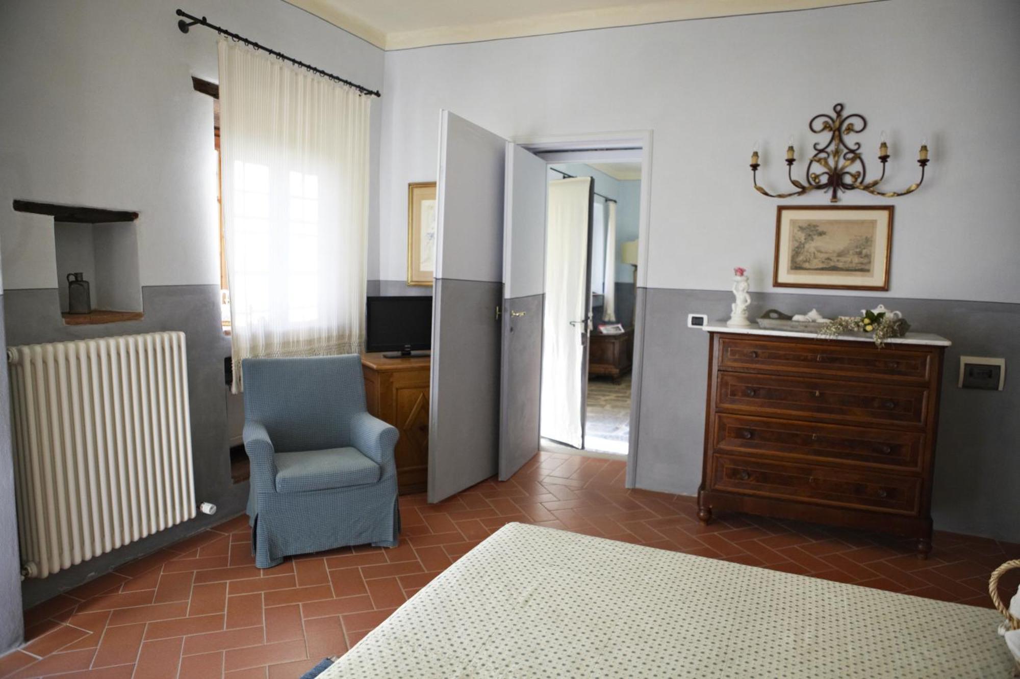 Relais Villa Belpoggio - Residenza D'Epoca Loro Ciuffenna Værelse billede