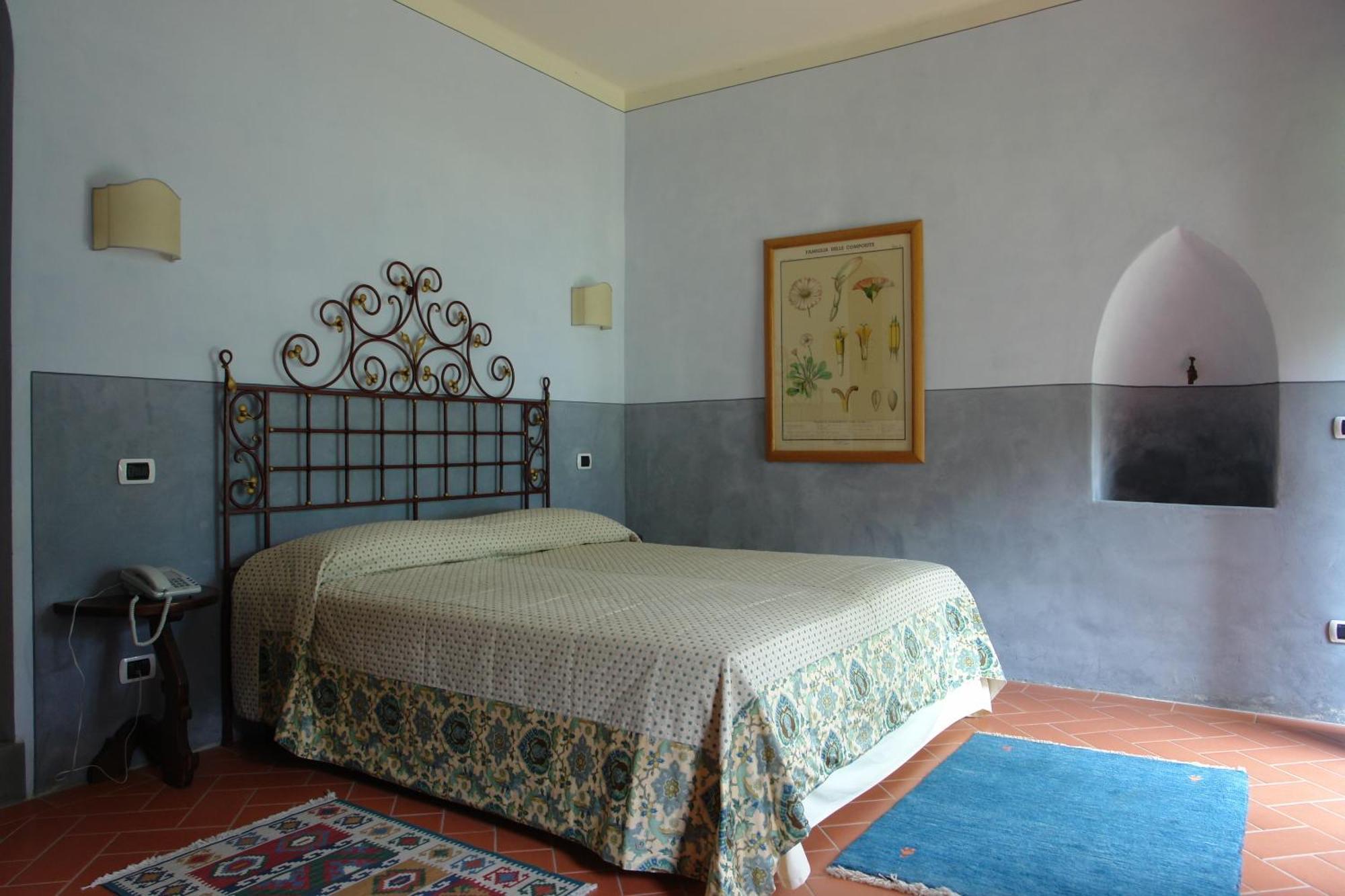 Relais Villa Belpoggio - Residenza D'Epoca Loro Ciuffenna Værelse billede
