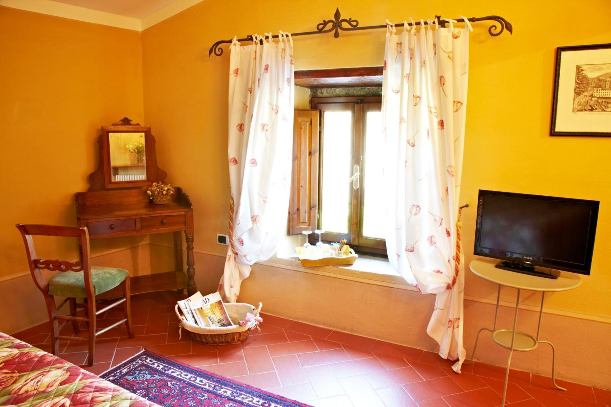 Relais Villa Belpoggio - Residenza D'Epoca Loro Ciuffenna Værelse billede
