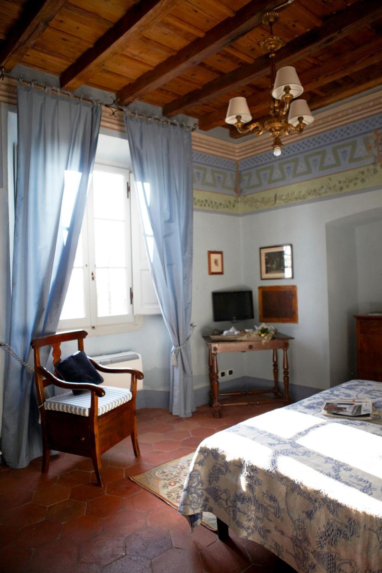 Relais Villa Belpoggio - Residenza D'Epoca Loro Ciuffenna Værelse billede