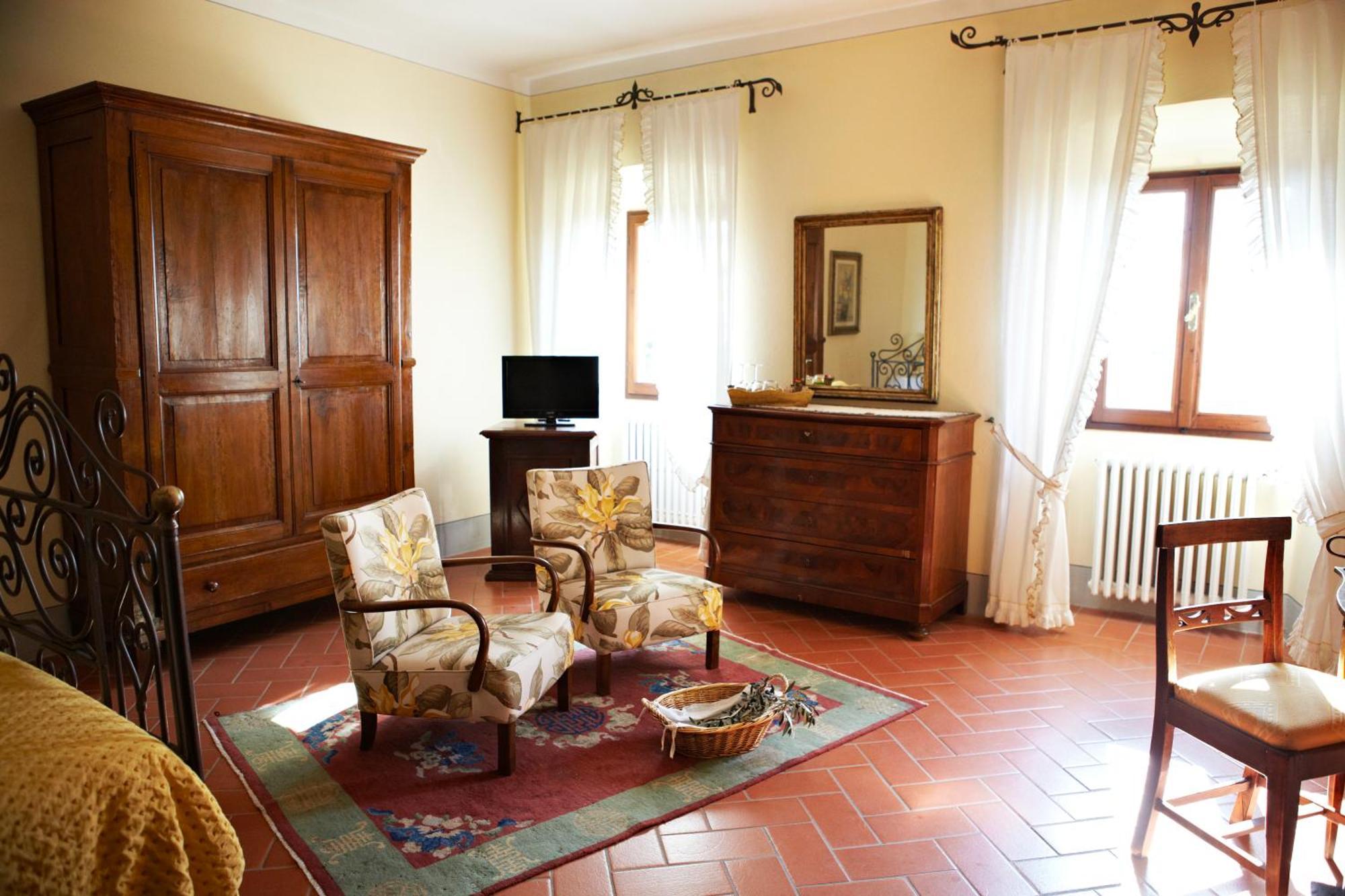 Relais Villa Belpoggio - Residenza D'Epoca Loro Ciuffenna Værelse billede